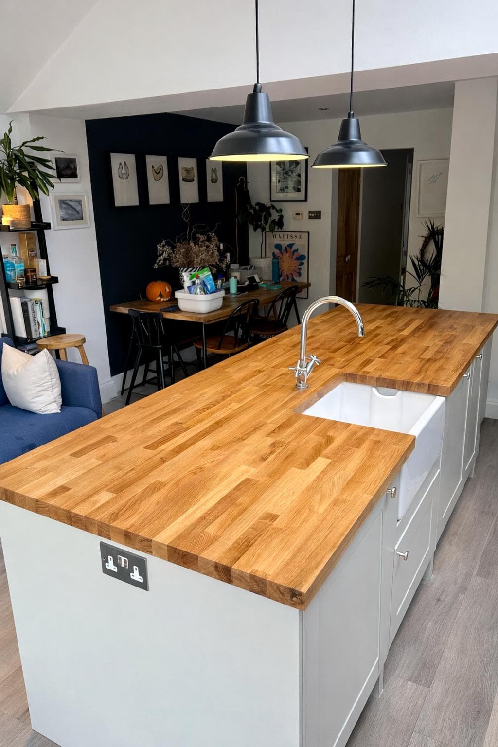 Fitted kitchen island with solid oak worktop and butler sink