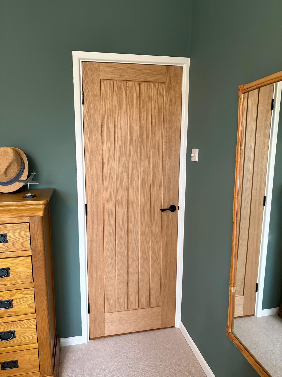 Oak internal door with quality ironmongery and precise joinery